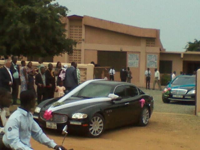 Wedding bells with the festooned Maserati and Mercedes Benz